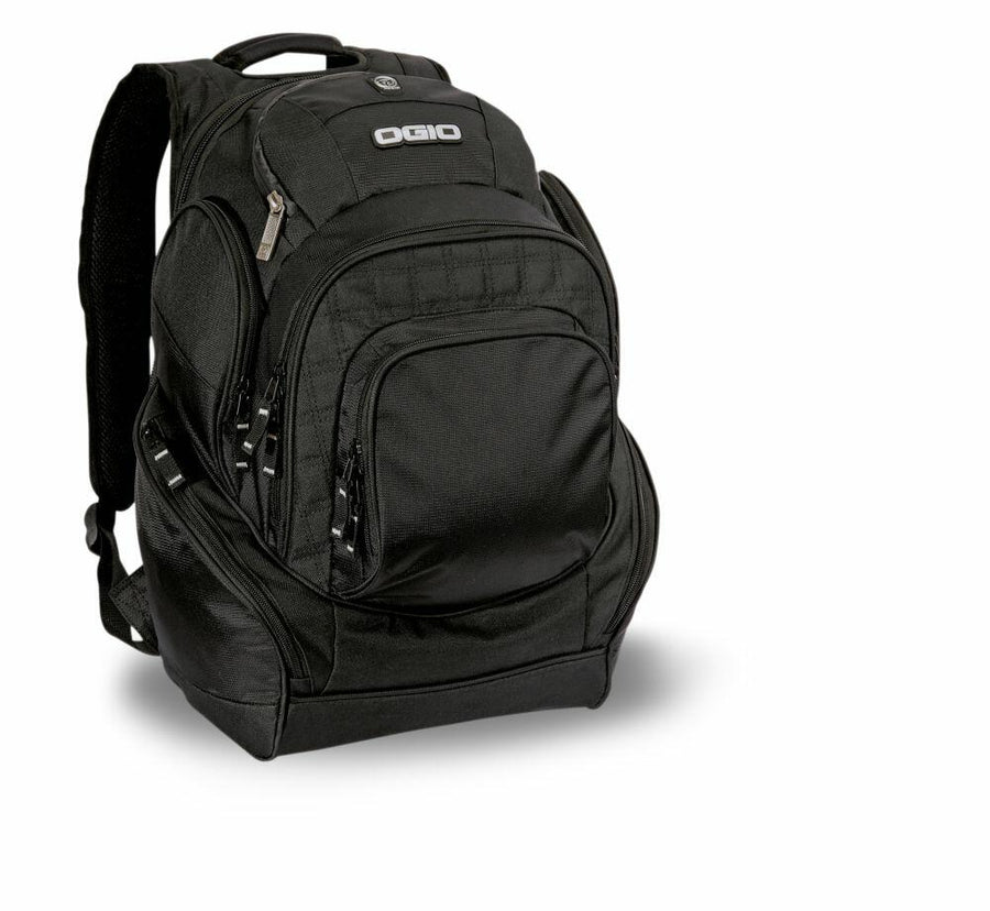 An OG002 backpack by Ogio, featuring multiple compartments and zippers, displayed against a white background.