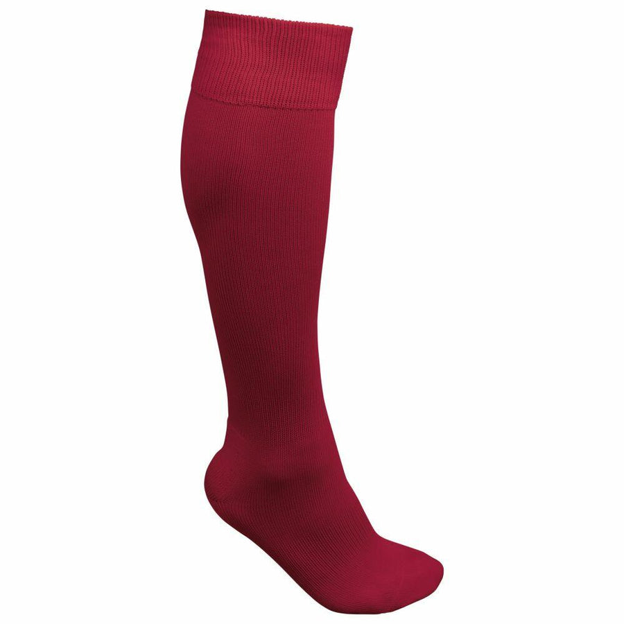A red knee-high sock from Kariban Proact (product code: PA016) displayed against a simple white backdrop.