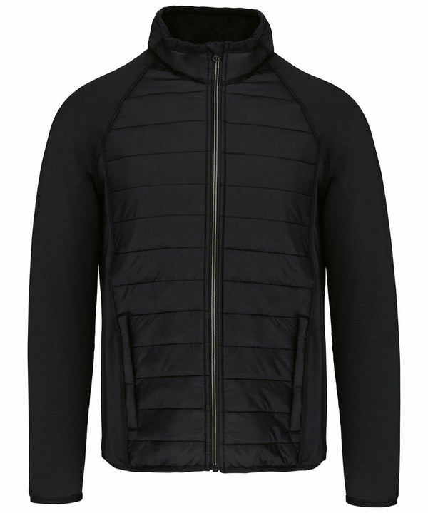 A black zip-up jacket with a quilted front and sleeves made of a different fabric. The product name is PA233 by Kariban Proact.