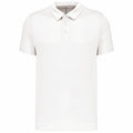 A plain white short-sleeve polo shirt with a collar and three buttons on the placket from Kariban Proact's PA482 range, displayed against a white background.