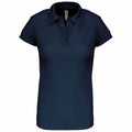 The product image features the Kariban Proact PA483, a navy blue short-sleeve polo shirt with a collar and a V-neck opening, displayed on a plain white background.