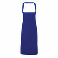 A plain blue apron from the Premier brand, model PR102, featuring a halter neck strap. This knee-length apron has a sleek design with no visible pockets or patterns and is showcased against a white backdrop.