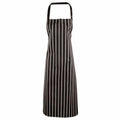 A Premier PR110 apron in black with vertical white stripes and a neck strap.