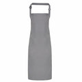 A Premier PR115 apron, featuring a plain gray design with an adjustable neck strap, is displayed against a white background. It extends down to the knees and showcases a simple, minimalist design.