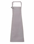 The Premier PR130 is a plain gray apron featuring a neck strap and adjustable side tie. It is displayed flat against a white background, highlighting its full length and minimalist design.