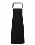 The Premier PR134 apron features a black color with an adjustable neck strap and a front pocket.