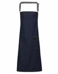The PR134 from Premier is a dark denim apron featuring a neck strap and a front pocket.