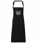 The Premier PR136 features a black apron with a gray front pocket and an adjustable neck strap.