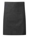 The PR141 by Premier is a denim apron in dark gray, featuring a straightforward design and a spacious front pocket.