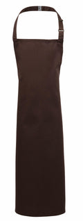 The Premier PR149 apron, featuring a plain brown design with a neck strap and adjustable side buckle, is showcased against a white background.