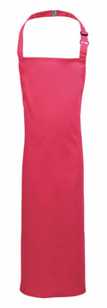 A Premier apron in a vibrant pink hue, featuring an adjustable neck strap and a sleek design without visible pockets, contrasted against a plain white background. Product Code: PR149.