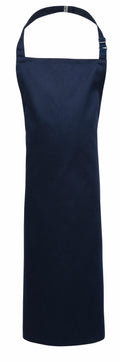 Displayed against a white background is the PR149 apron by Premier, featuring a plain dark blue color with an adjustable neck strap and a simple, sleek design devoid of any visible patterns or embellishments.