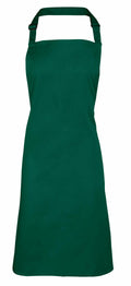 The PR150 apron by Premier is a plain dark green apron featuring an adjustable neck strap and waist ties, displayed against a white background.