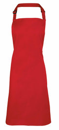 The Premier PR150 is a plain red apron featuring an adjustable neck strap and ties at the waist. Its clean and simple design makes it perfect for both cooking and crafting activities.