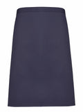 The Premier PR151 is a knee-length A-line skirt in navy blue, featuring a simple design with a smooth fabric texture and a solid color without any patterns or embellishments.
