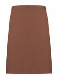 A brown, knee-length, straight-cut PR151 skirt by Premier, featuring a plain design and shown from the front against a white background.