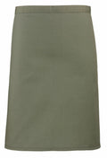 Product PR151 by Premier is an elegant olive green skirt featuring a straight cut and knee-length hem, crafted from fabric that is smooth with a subtle texture.