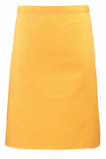 The Premier PR151 is a knee-length skirt in bright yellow featuring a straight and simple design.