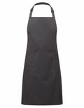 The Premier PR154 is a plain black apron featuring an adjustable neck strap and a large central pocket. It is designed for kitchen or culinary use, offering coverage and protection for clothing.