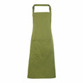 A Premier PR154 green apron featuring a neck strap and a large front pocket, presented against a white background.