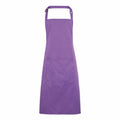 A Premier PR154 purple apron featuring an adjustable neck strap and a spacious front pocket.