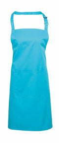 The Premier PR154 apron, featuring a vibrant blue color, adjustable neck strap, and front pocket, is showcased against a white background.