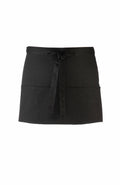 Premier's PR155 black waist apron features pockets and a tied belt.