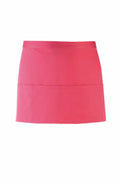 The Premier PR155 is a fuchsia waist apron with a front tie and two large pockets.