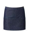 A PR155 denim skirt from Premier, in dark blue with a straight cut and no visible embellishments, displayed on a white background. The skirt has a subtle horizontal seam running across the middle.