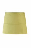 The Premier PR155 is a light green waist apron featuring two large front pockets and simple stitching, crafted from durable fabric ideal for kitchen or gardening use.