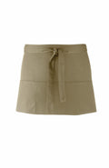 A khaki half apron by Premier, featuring a waist tie and two front pockets, showcased against a plain white background. Model Number: PR155.