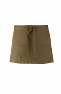 The Premier PR155 is a khaki waist apron featuring a front tie and two pockets, showcasing a simple and functional design.