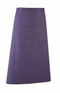 A Premier PR158 purple waist apron featuring a large front pocket, neatly displayed on a plain background.