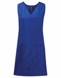 Premier's PR174 is a sleeveless tunic featuring a blue color, V-neck design, and two large front pockets.