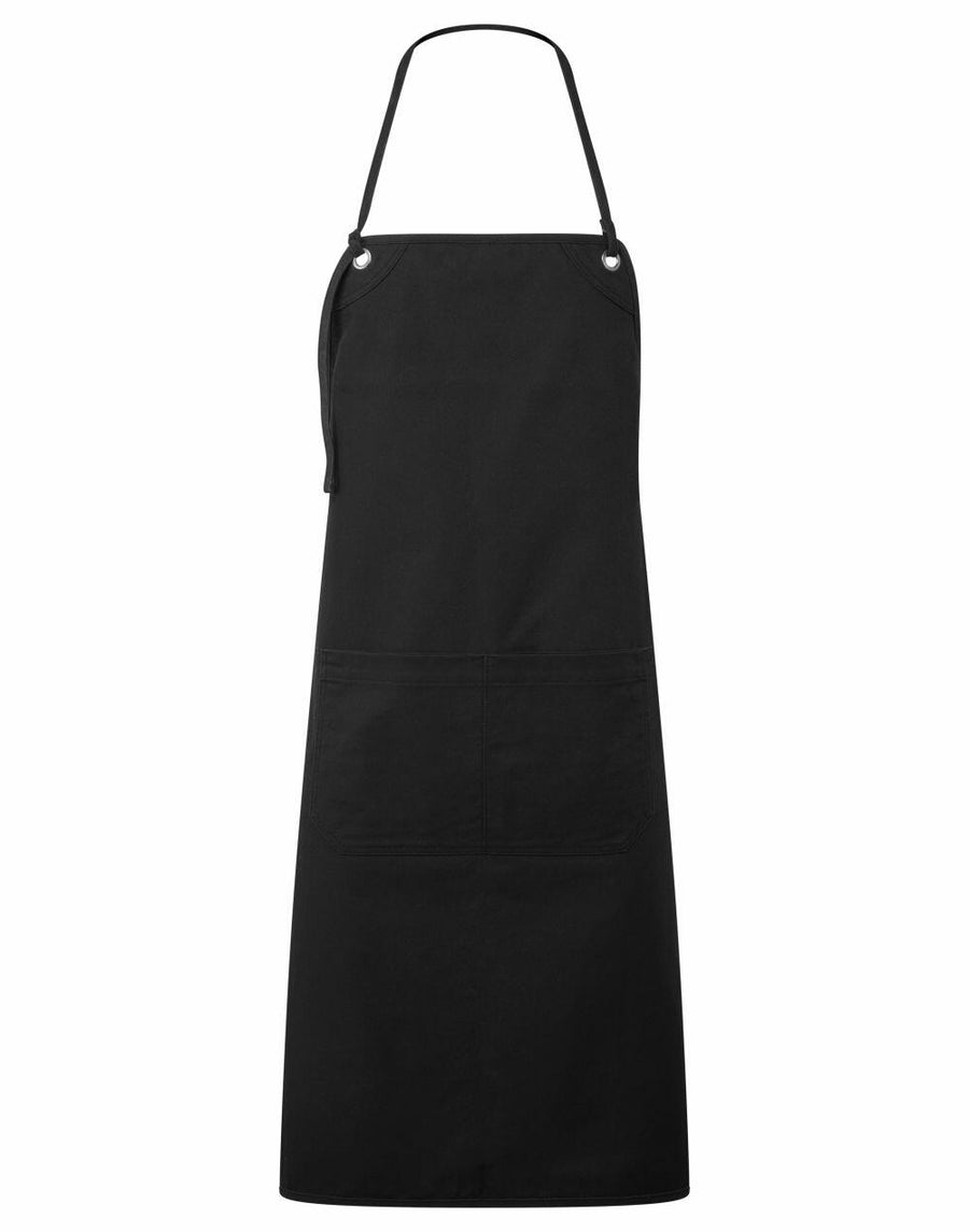 A Premier PR181 plain black apron with neck and waist ties hanging against a white background.