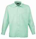 The Premier PR200 is a button-up shirt featuring long sleeves, a front pocket, and comes in light green.