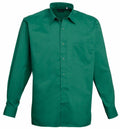 The Premier PR200 is a solid green, long-sleeved button-up shirt with a single chest pocket and classic collar, showcased on a plain white background.