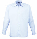 The Premier PR200 is a light blue collared shirt featuring long sleeves, a front pocket, and buttons running down the middle.
