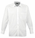 The Premier PR200 is a long-sleeved white dress shirt featuring a front pocket and button-down closure. It comes with a classic collar, cuffed sleeves, and has a smooth, slightly shiny fabric finish.