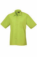 The Premier PR202 is a lime green short-sleeve button-up shirt featuring a single chest pocket, elegantly presented against a plain white background.