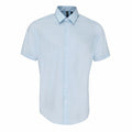 Light blue short-sleeve button-up shirt with a collar from the Premier brand (Product Name: PR209), displayed on a plain white background.