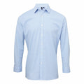 Premier's PR220 offers a light blue long-sleeve button-up shirt featuring a pointed collar.