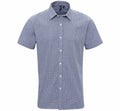 Premier's PR221 is a gray short-sleeve button-up shirt featuring a subtle checkered pattern.
