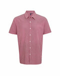 Introducing the Premier PR221: a red short-sleeve button-up shirt adorned with a subtle white check pattern on a pristine white background. This stylish piece features a classic collar and is finished with elegant white buttons running down the front.