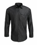 A Premier PR222 long-sleeved button-up shirt in dark gray featuring a chest pocket.