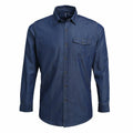 Premier's PR222 is a dark blue denim button-up shirt featuring long sleeves and a single chest pocket on the left side.