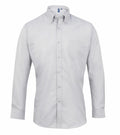 Premier's PR234 is a button-up white long-sleeve shirt with a chest pocket, displayed on a white background.