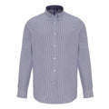 The Premier PR238 is a long-sleeved button-down shirt featuring subtle vertical pinstripes in shades of blue and white, complete with a classic collar, cuffs, and front buttons.
