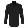 The product PR244 by Premier is a black, long-sleeve button-up shirt with a collar, neatly folded.