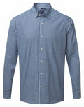 A Premier PR252 shirt featuring a blue and white checkered pattern with long sleeves and button-up design, showcased on a simple backdrop.